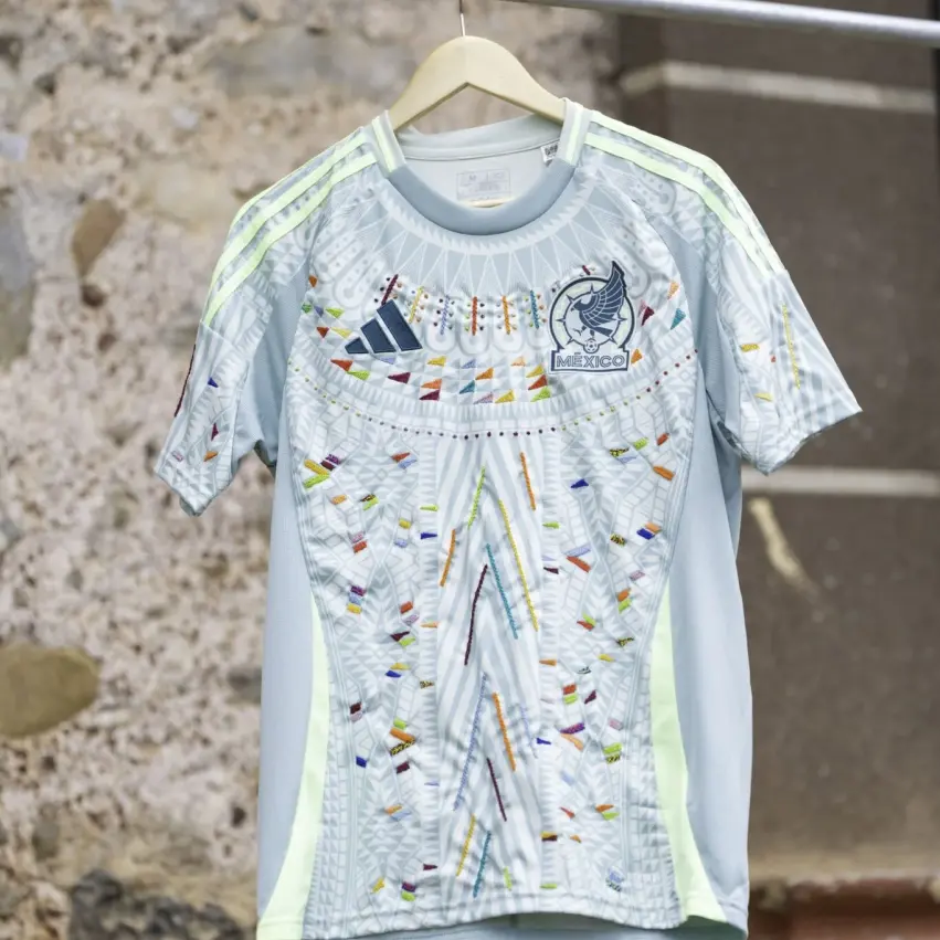 soccerbible.com/design/miscellaneous/2024/adidas-someone-somewhere-embellish-mexico-jerseys-with-hand-embroidered-details